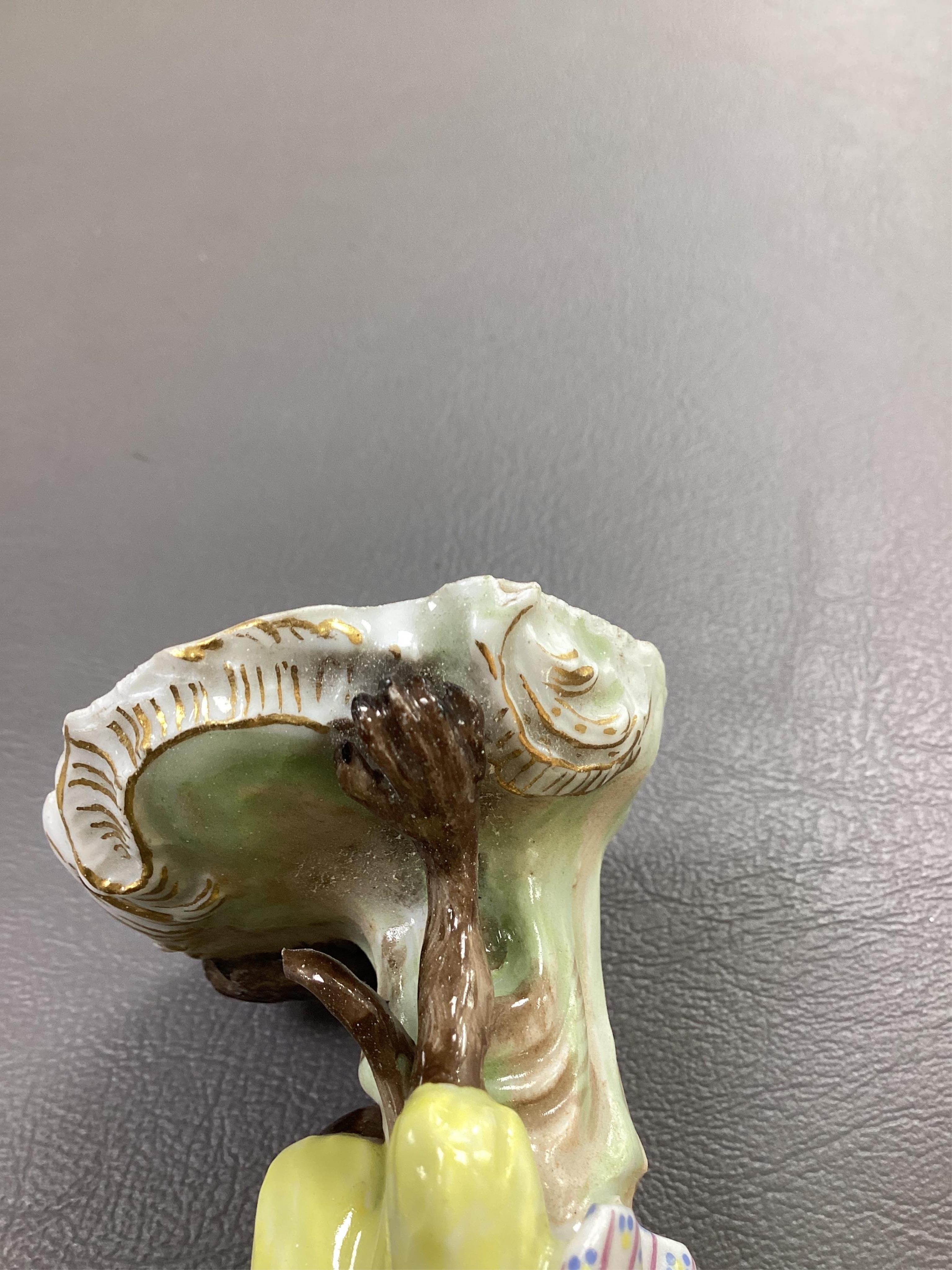 A Meissen monkey band figure of a piccolo player modelled after J. J. Kaendler, 19th century